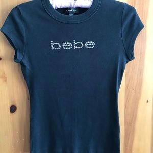 Black, diamond-studded Bebe top.